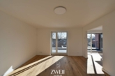 Wohn-Esszimmer - Wohnen im Neubau mit Aufzug: 2-Zimmer-Wohnung mit sonniger Dachterrasse!