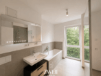 Badezimmer - Lichtdurchflutete, moderne Wohnung mit ruhigem Süd-West-Balkon und Tiefgaragenstellplatz!