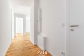 Flur - Sofort einziehen: 3-Zimmer-Neubauwohnung mit großem Süd-Garten!