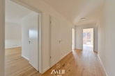 Flur - Einzug ab April: Helle Neubauwohnung in der Endetage mit Süd-Balkon und viel Platz!