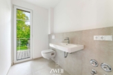 Gäste-WC - Lichtdurchflutete Neubauwohnung in der Endetage: Mit dem Aufzug bis in die eigene Wohnung!