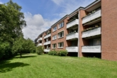 Gebäudeansicht - Gut vermietete 2,5-Zimmer-Wohnung mit Blick ins Grüne!