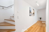 Treppenaufgang - Sofort einziehen: Neubau-Maisonettewohnung mit Süd-West-Terrasse und Garten!