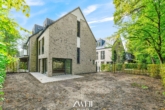 Haus- und Gartenansicht - Hausgefühl trifft Moderne: Bezugsfertiges Neubau-Stadthaus mit ruhigem Garten!